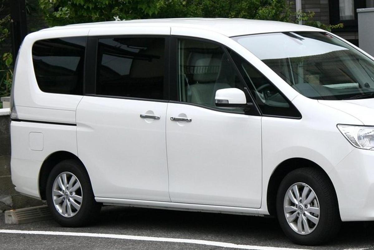 a white van parked in a parking lot