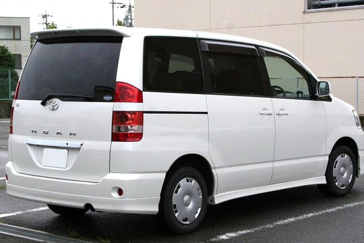 a white van parked in a parking lot