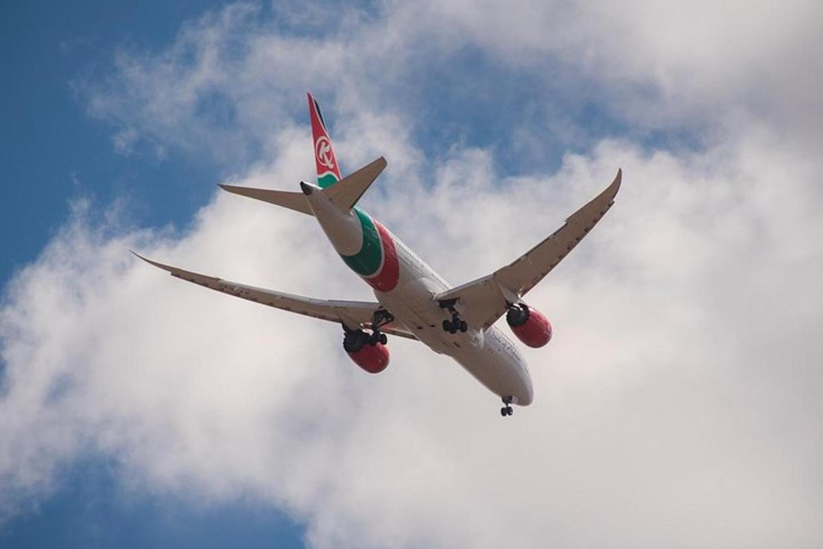 an airplane is flying in the sky