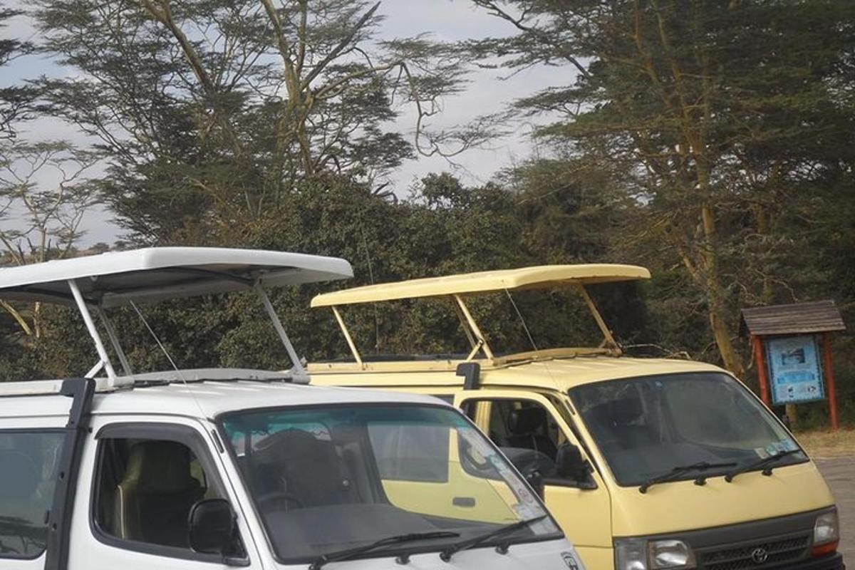 a yellow van with a surfboard on top of it