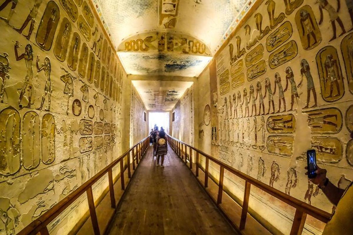 a person walking down a hallway in an art museum