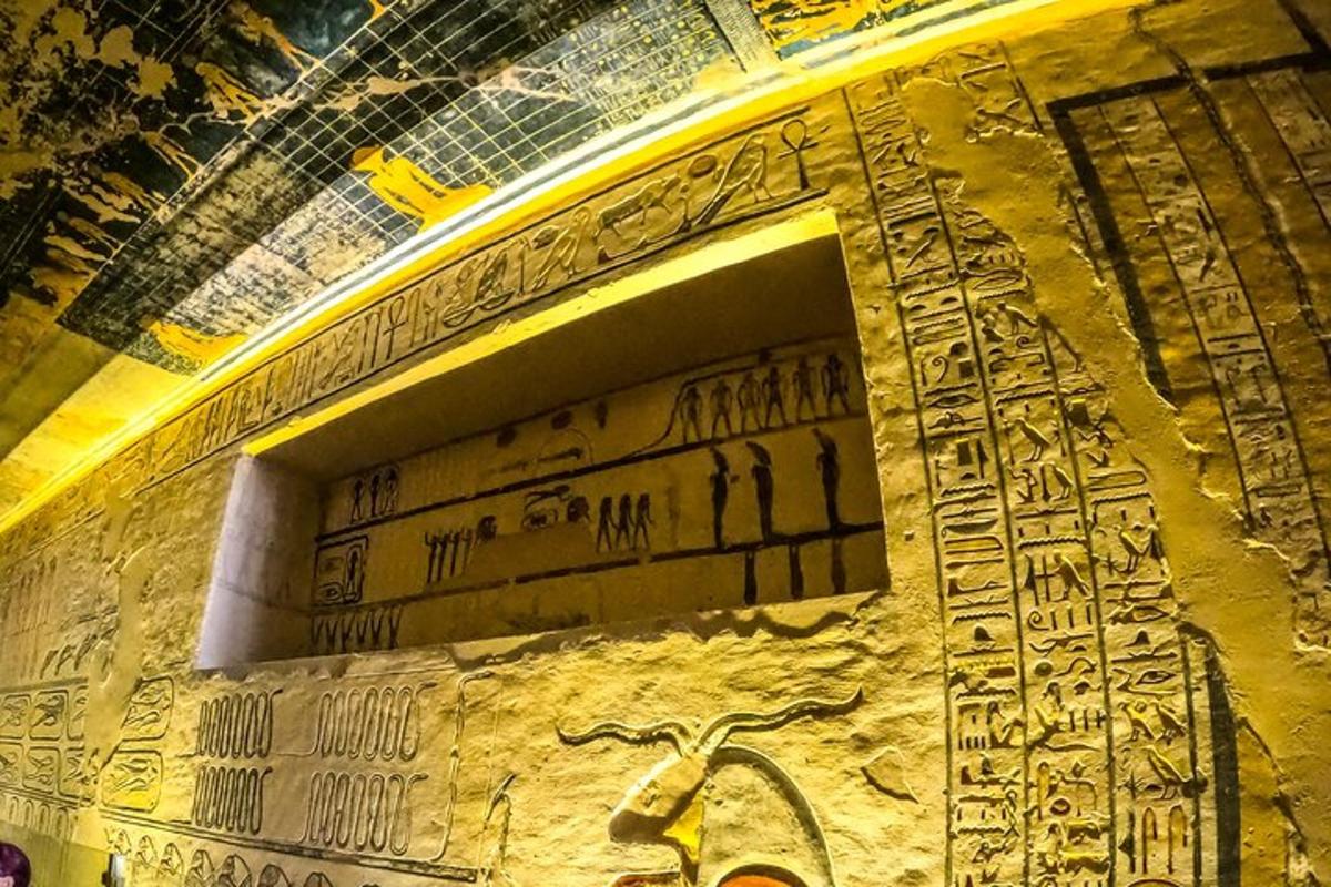 a wall with hieroglyphics on it in a museum