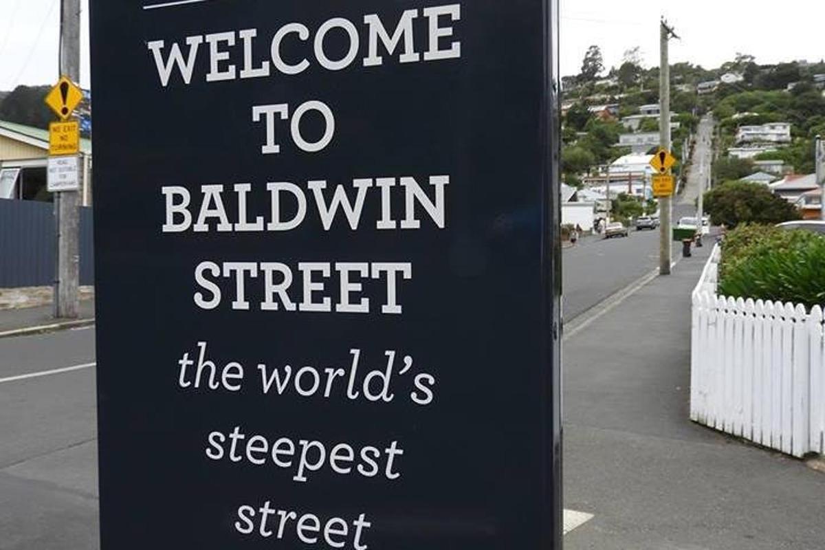 nápis s nápisom „Vitajte na Baldwin Street, Svetová ulica“