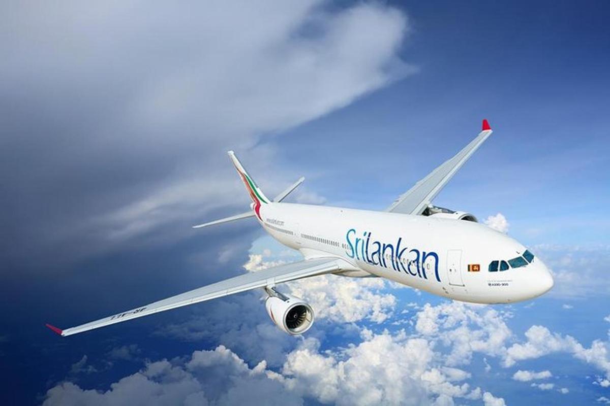 an airplane flying in the sky above the clouds