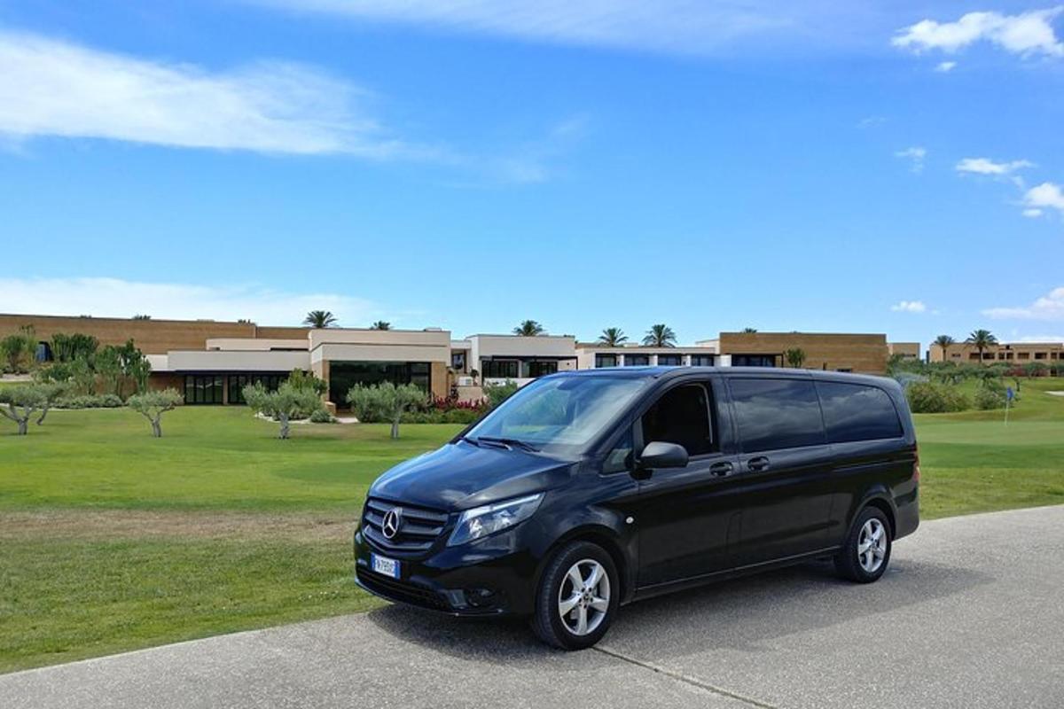 a black van parked in a parking lot