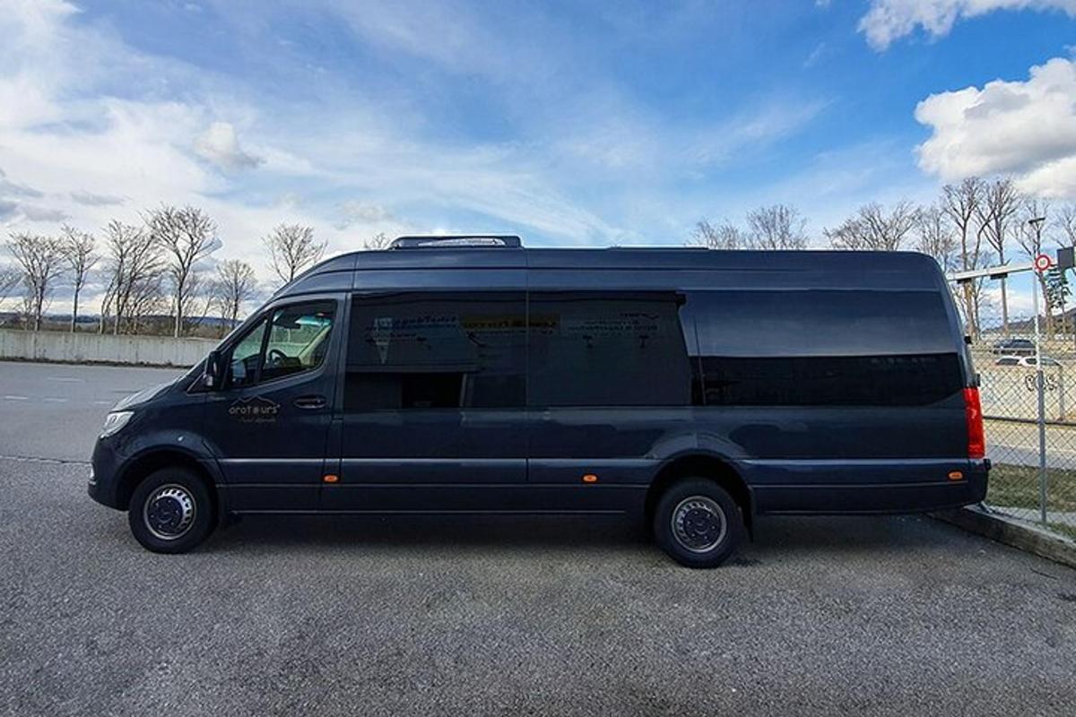 a blue van parked in a parking lot