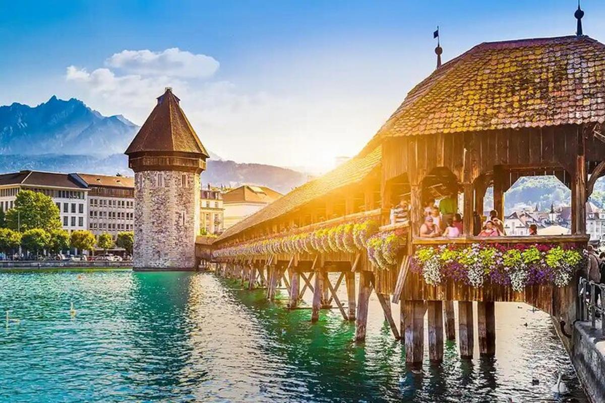 a bridge over a body of water with people on it