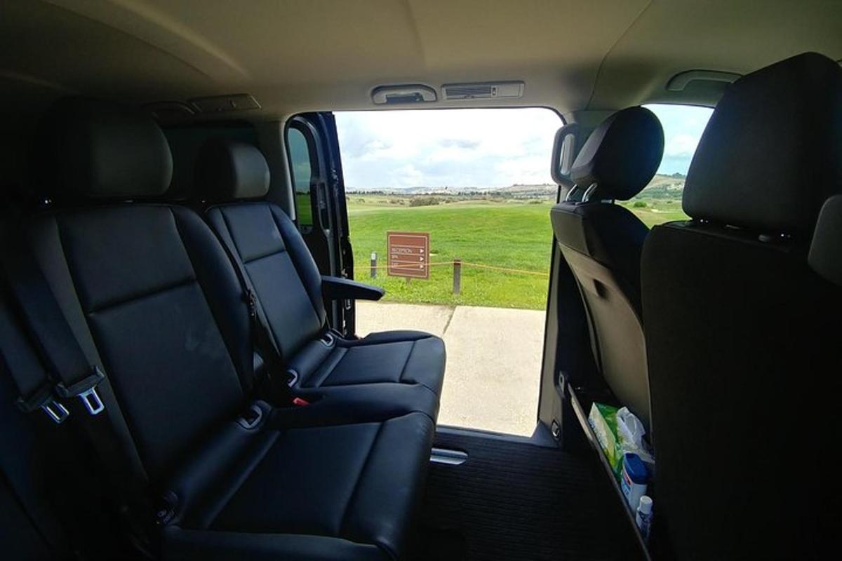 a view of the back of a van with the door open