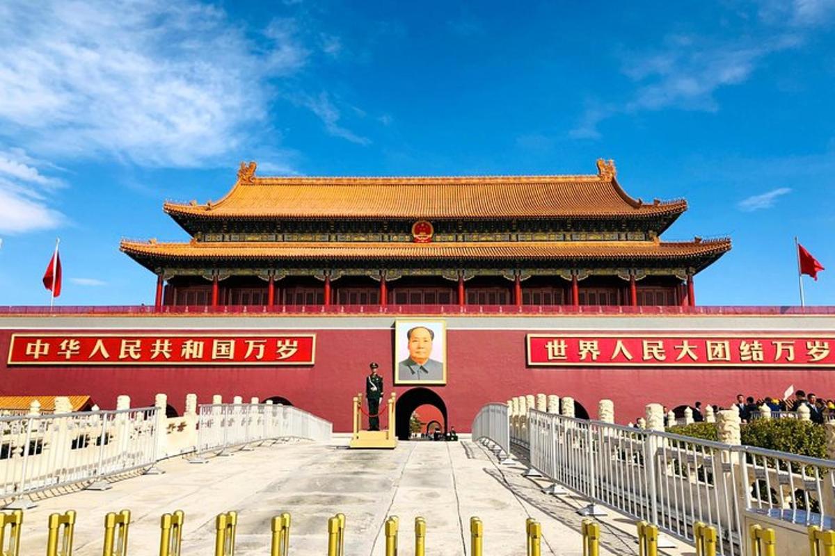 a red building with a portrait of a man on it