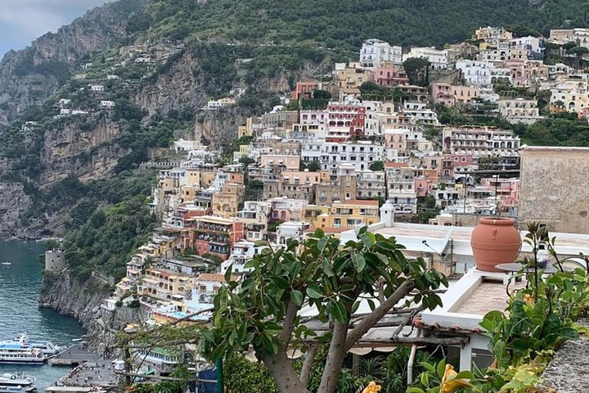 a group of buildings on the side of a mountain