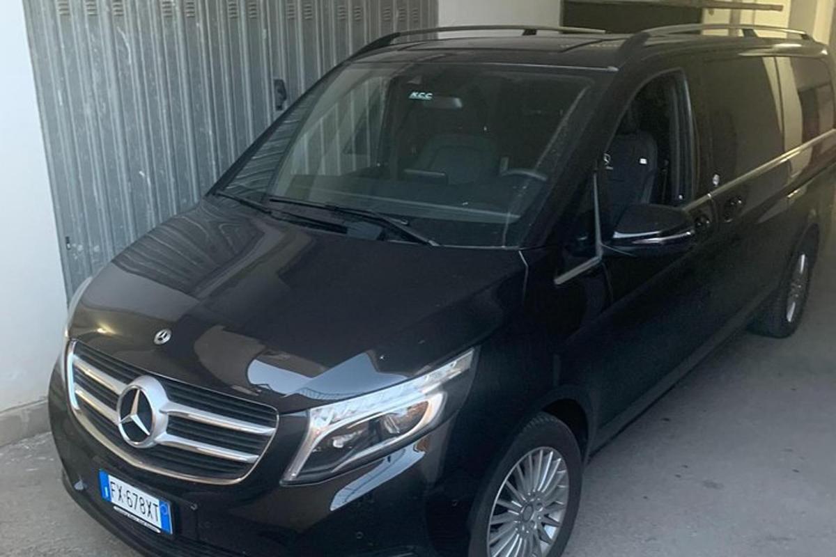 a black van is parked in a garage