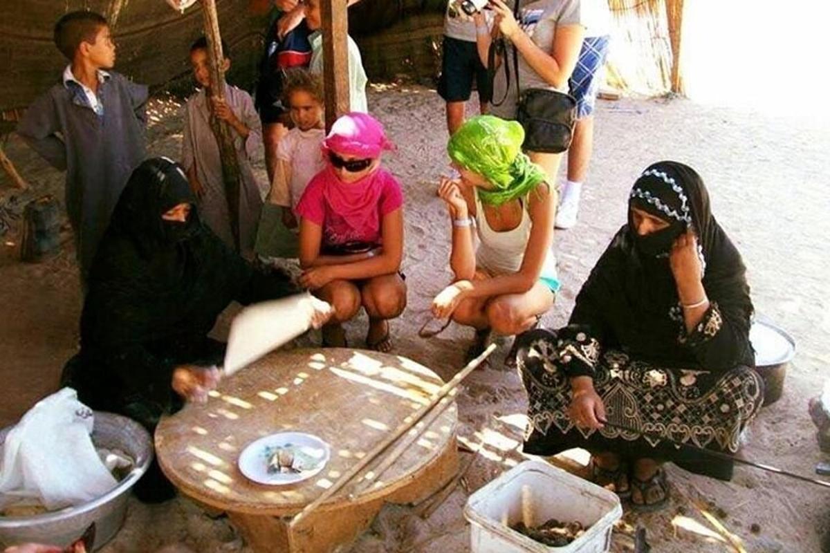 a group of people sitting around a table