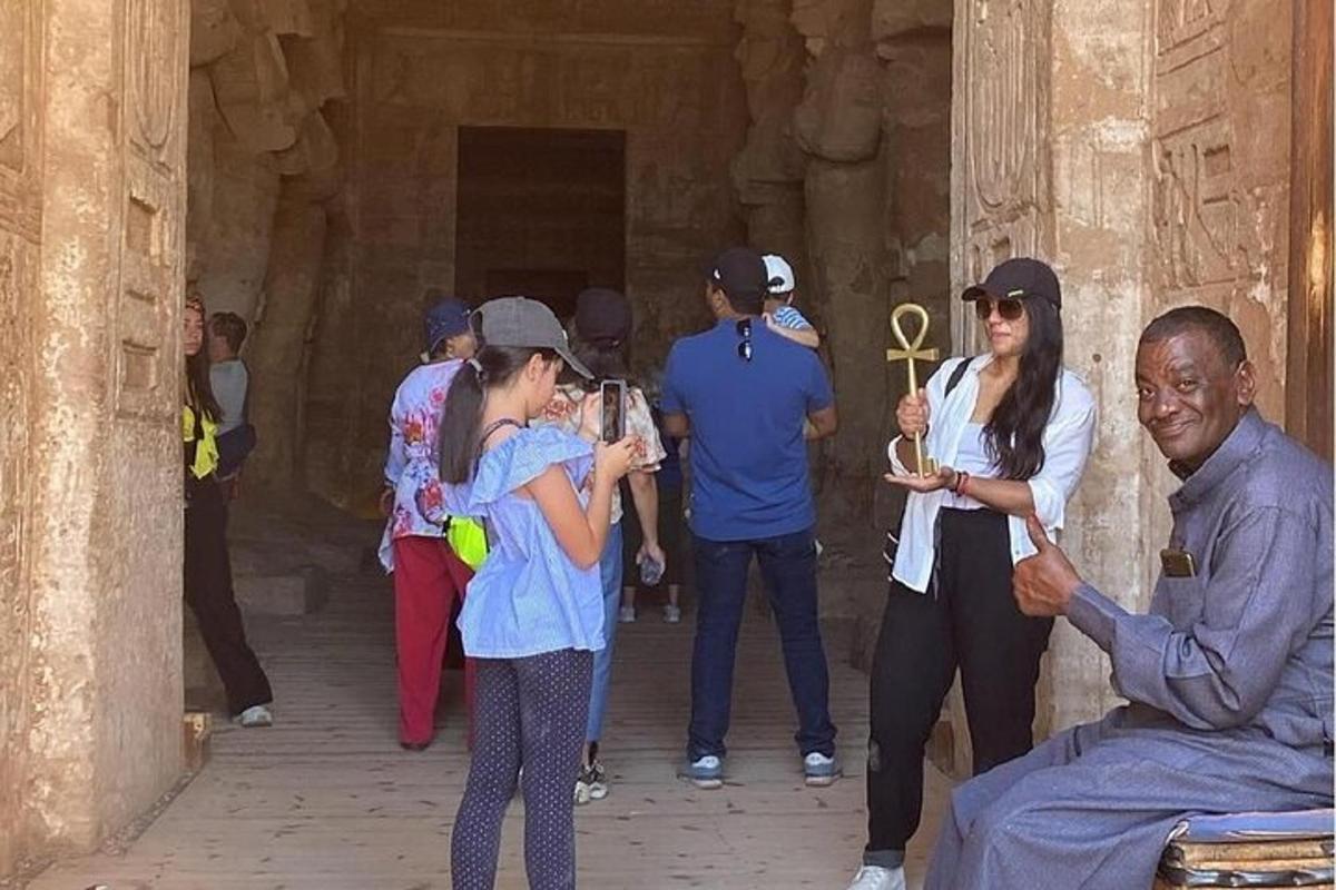 a group of people standing inside of a building