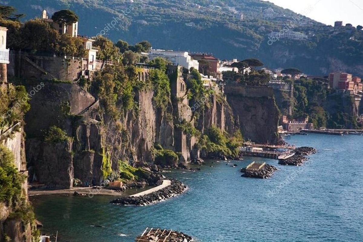 a view of the amalfi coast with boats in the water