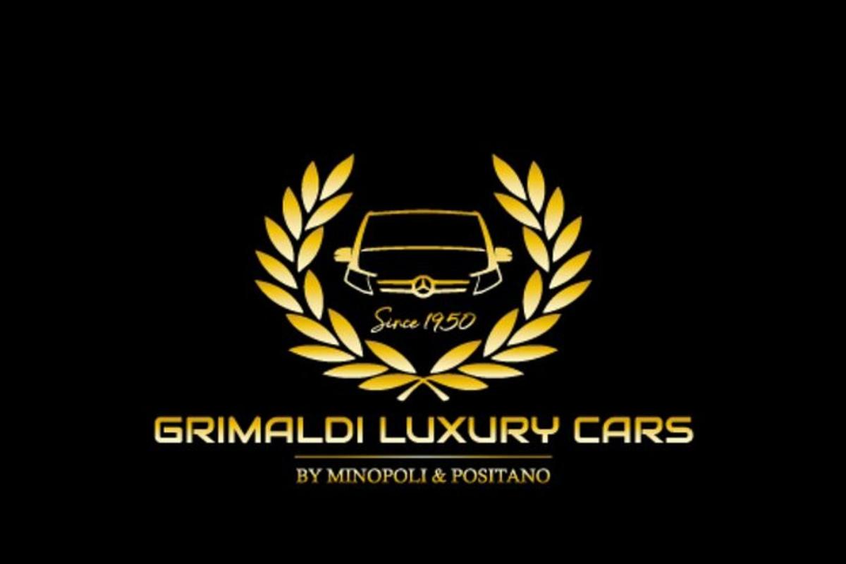 a gold laurel wreath with a car in it