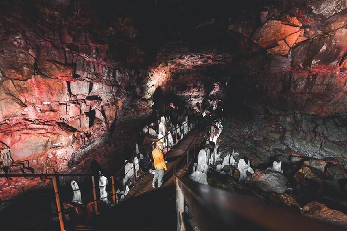 a group of people standing in a cave