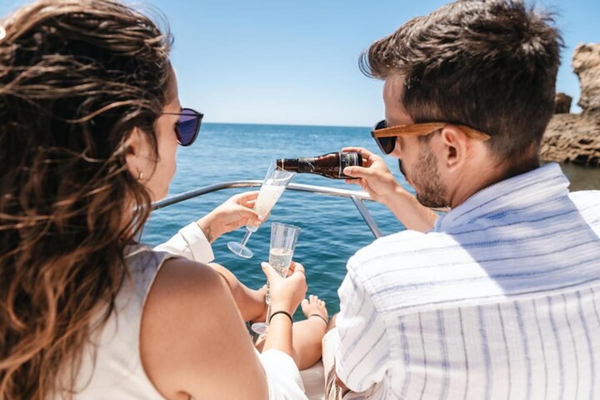 a man and a woman on a boat with wine glasses