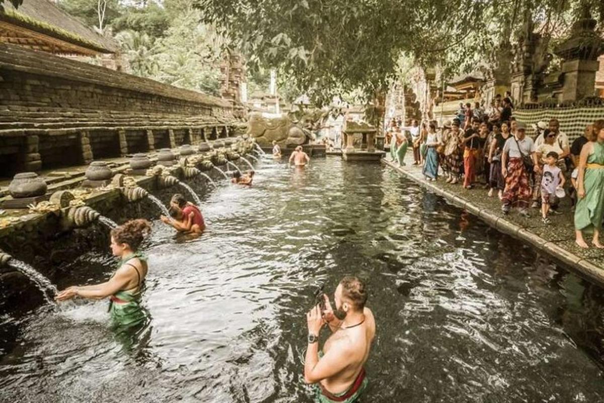 a group of people in the water in a river