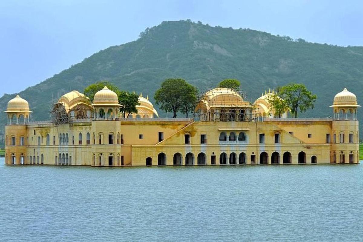 a large building in the middle of a body of water