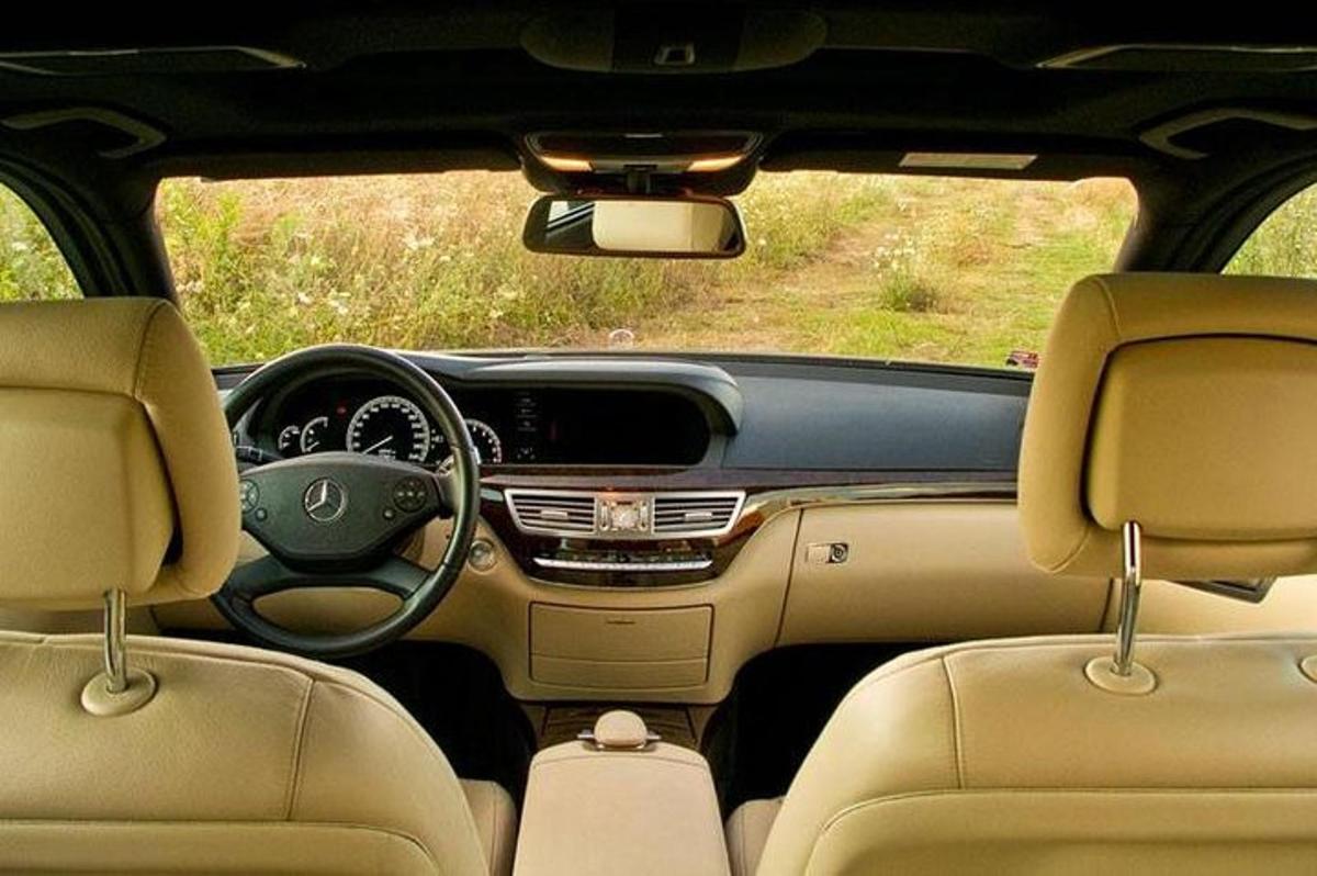 a view of the dashboard of acedes benz car