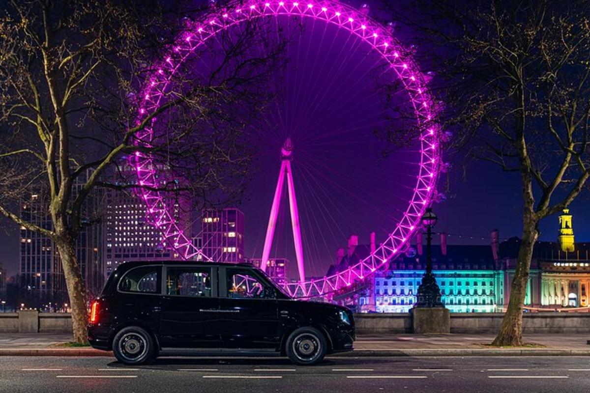 auto zaparkované v noci před London Eye