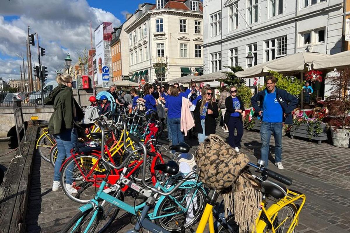 a group of bikes parked on a city street