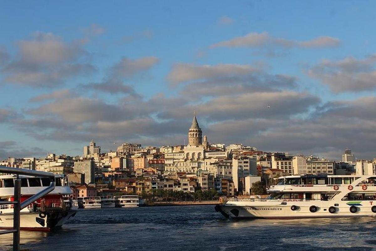 two boats in the water with a city in the background