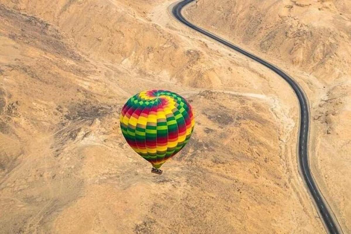 a colorful hot air balloon in the desert