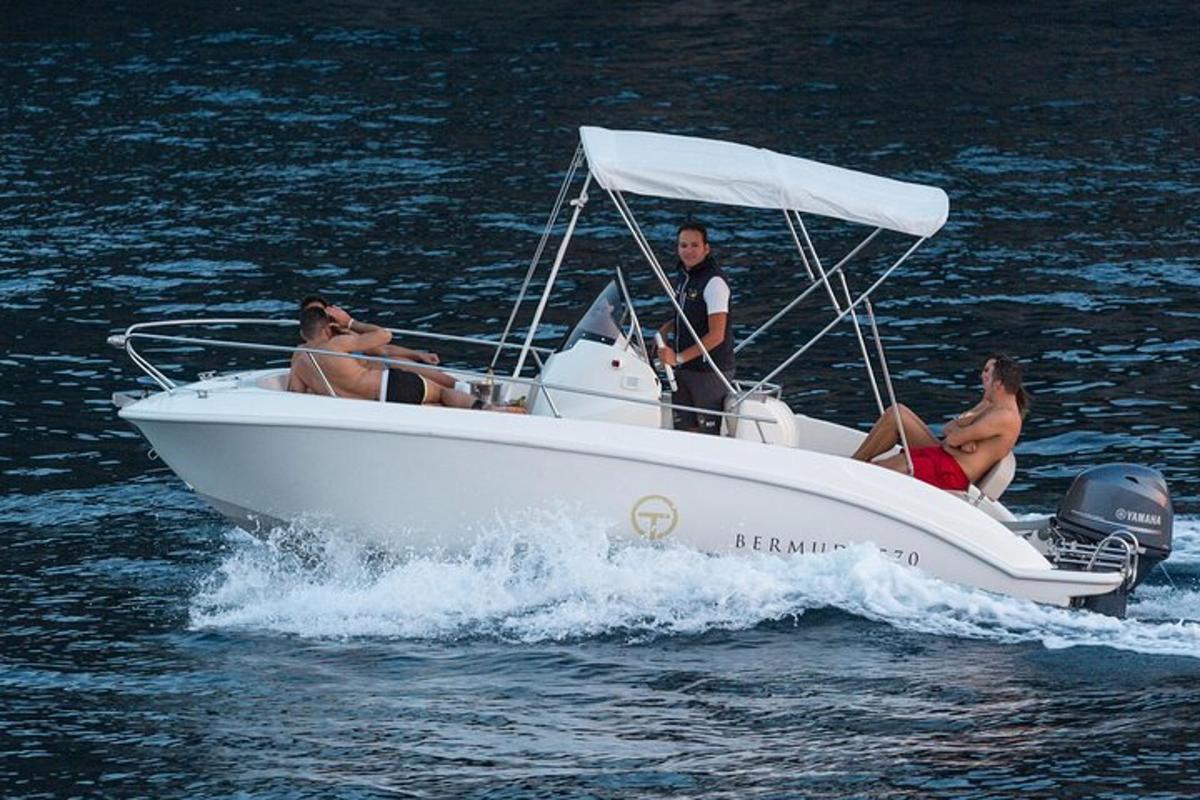 a group of people on a boat in the water