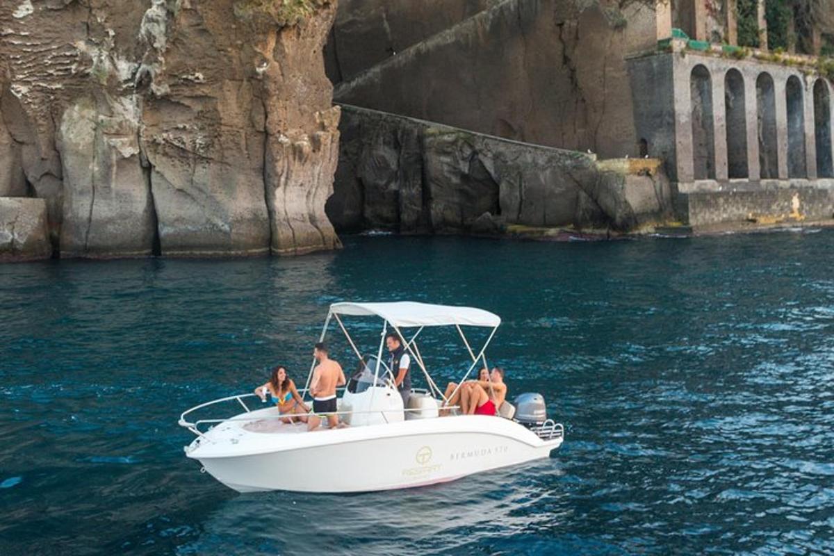 a group of people on a boat in the water
