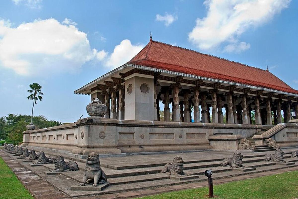 a large building with statues in front of it