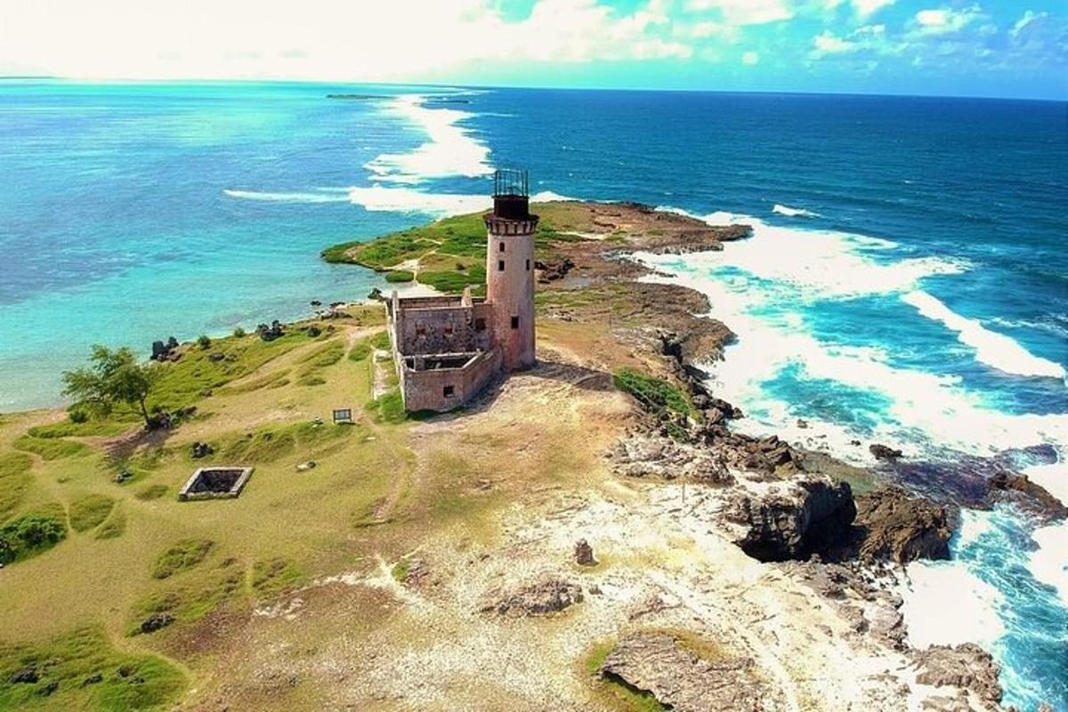 a lighthouse on an island in the ocean
