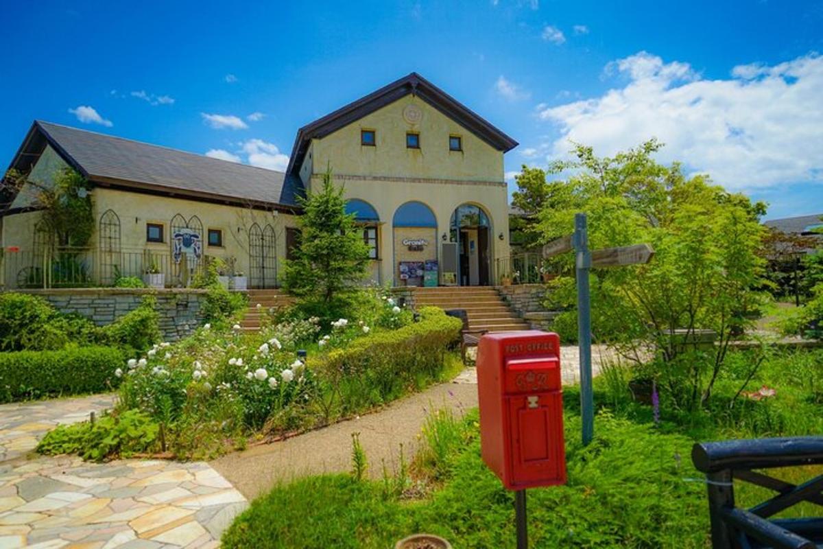 a house with a red mail box in front of it