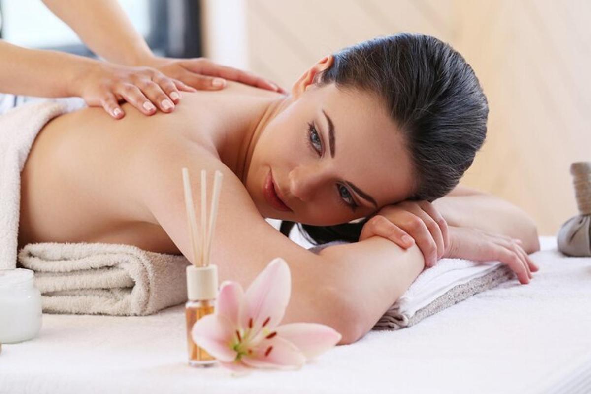 a woman getting a massage at a spa