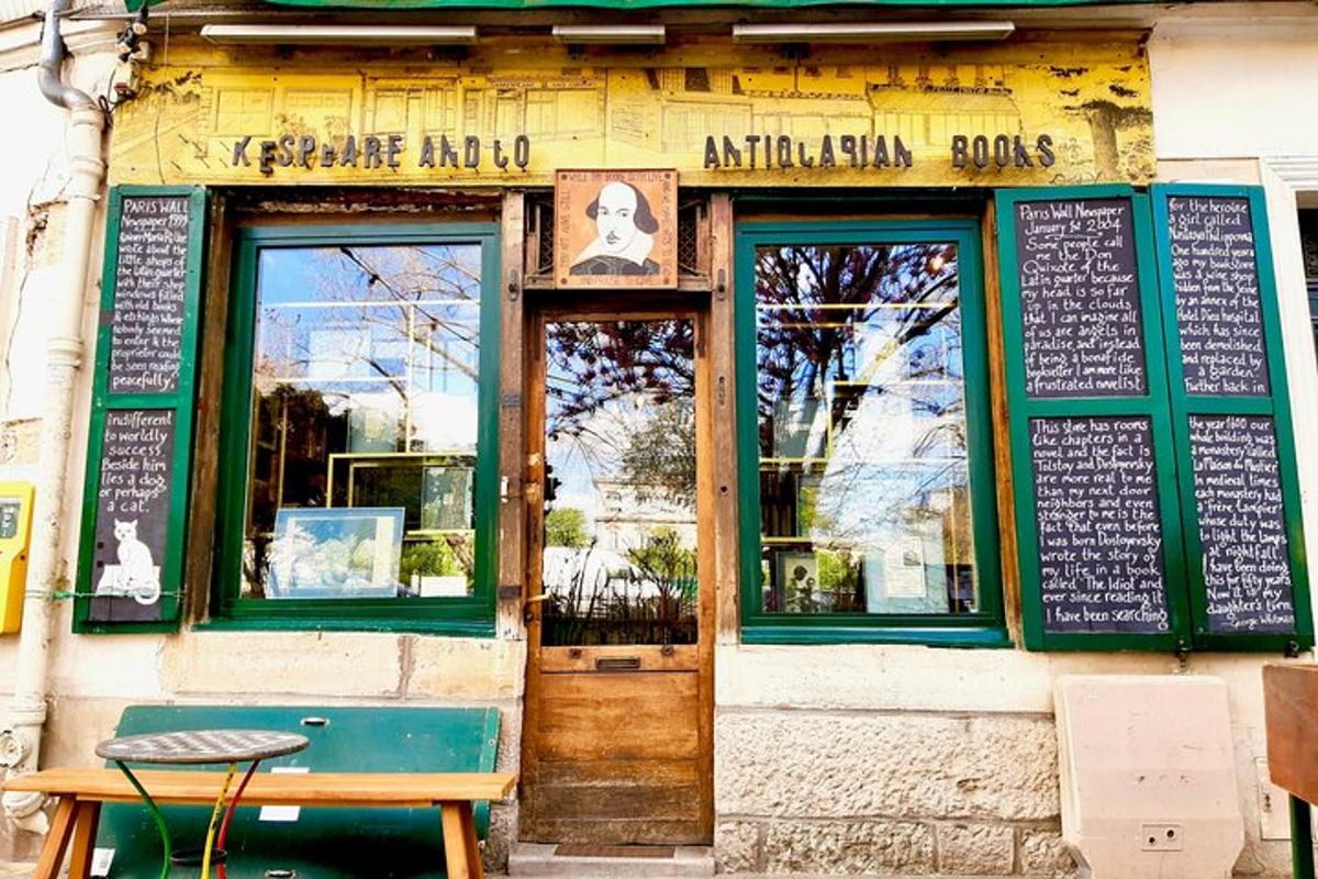 a restaurant with a wooden door and a table outside