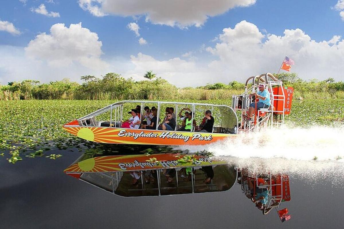 a group of people riding a boat on the water
