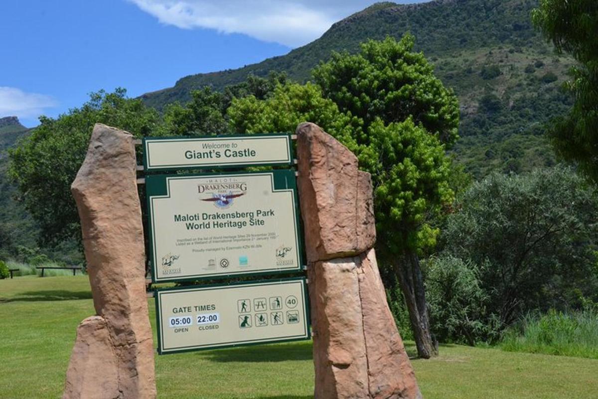 a sign for a golf course in a park
