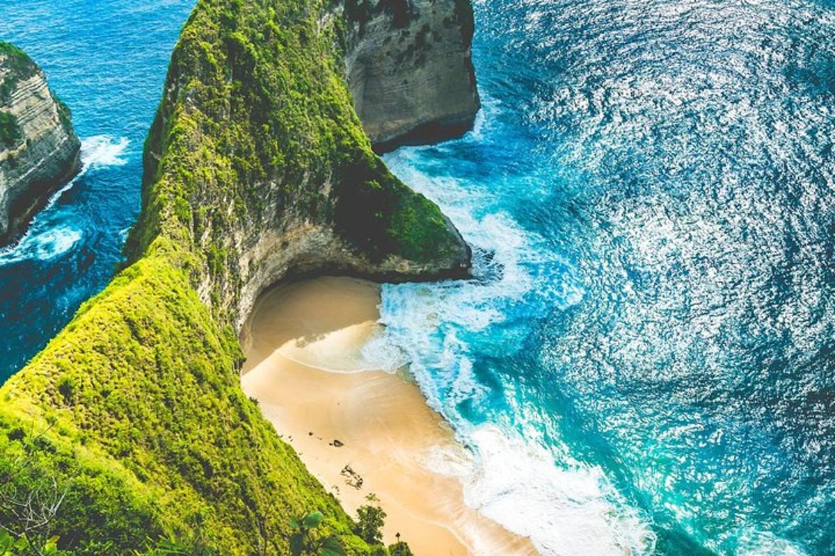 an aerial view of a beach next to the ocean