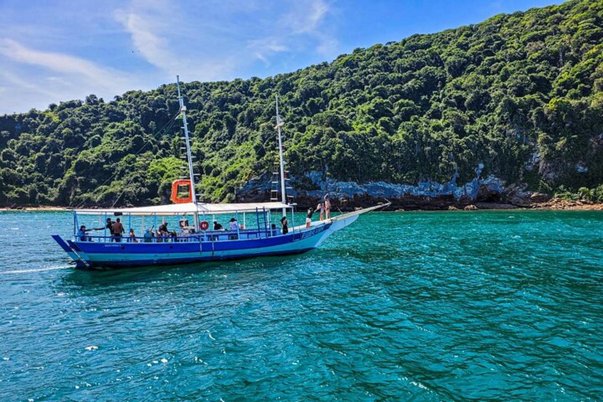 a group of people on a boat in the water