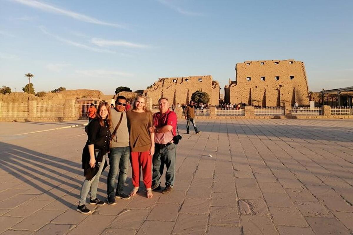 a group of people standing in front of a castle