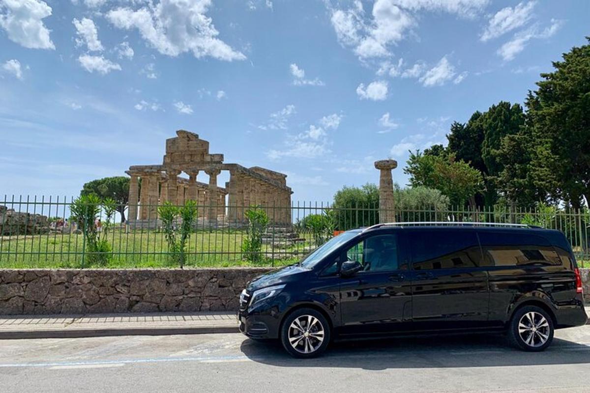 a black van parked in front of a building