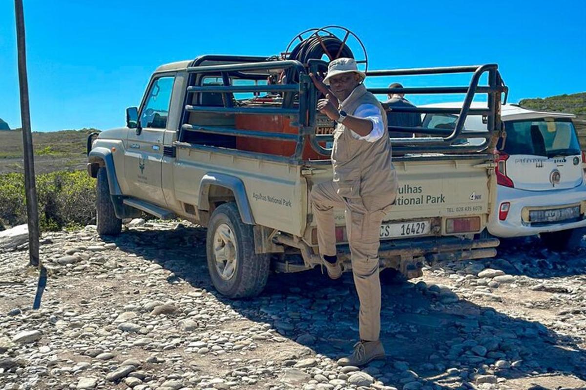 a man standing in front of a truck