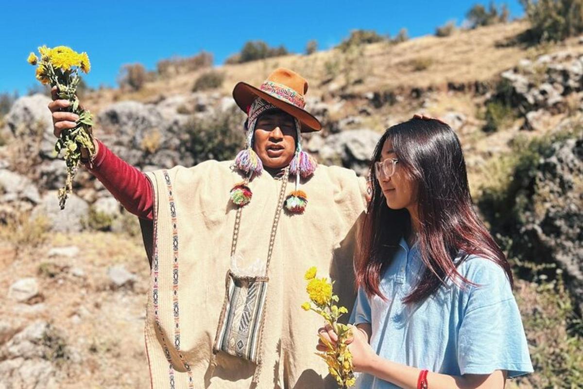a woman standing next to a man holding flowers