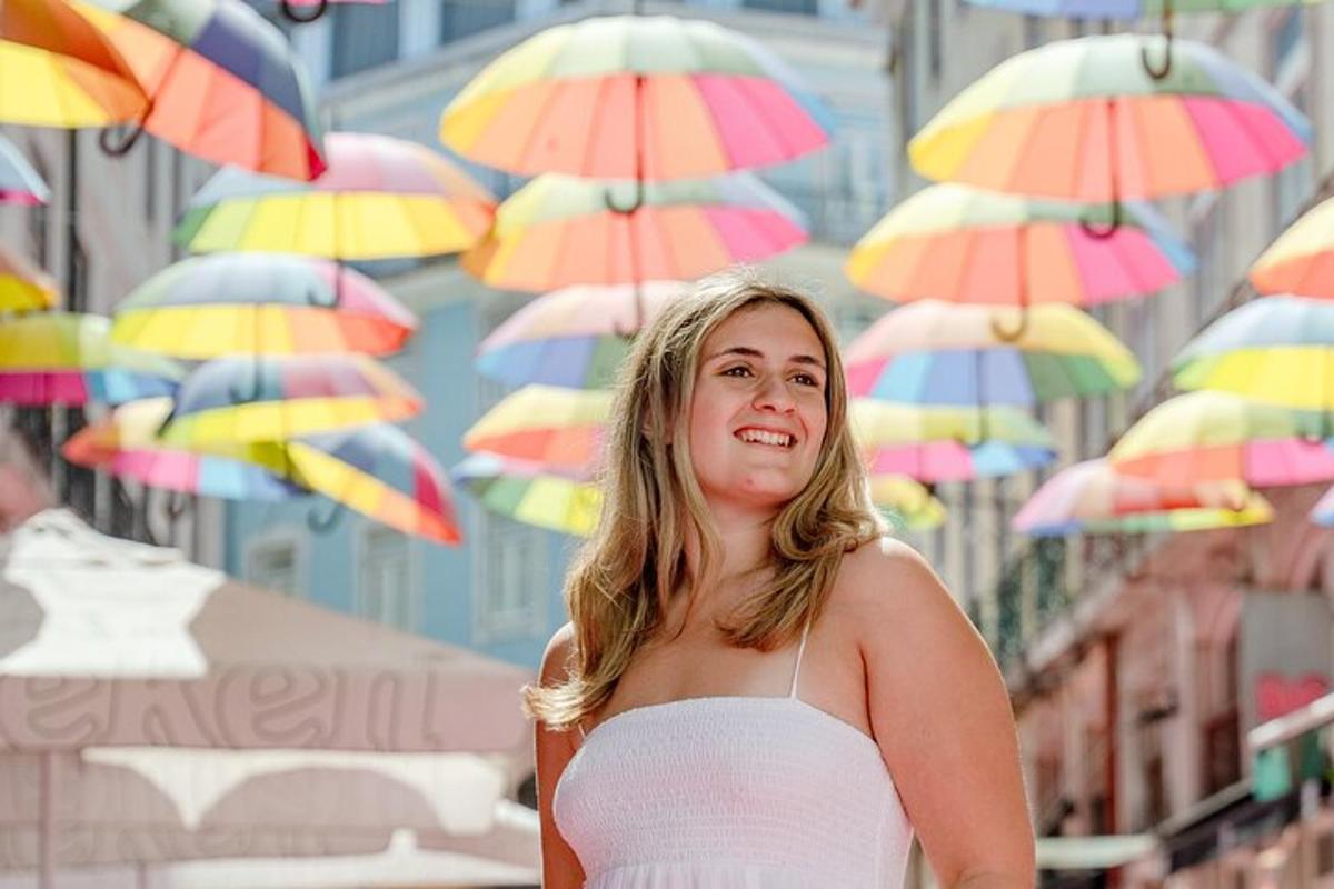 a woman standing in front of a group of umbrellas