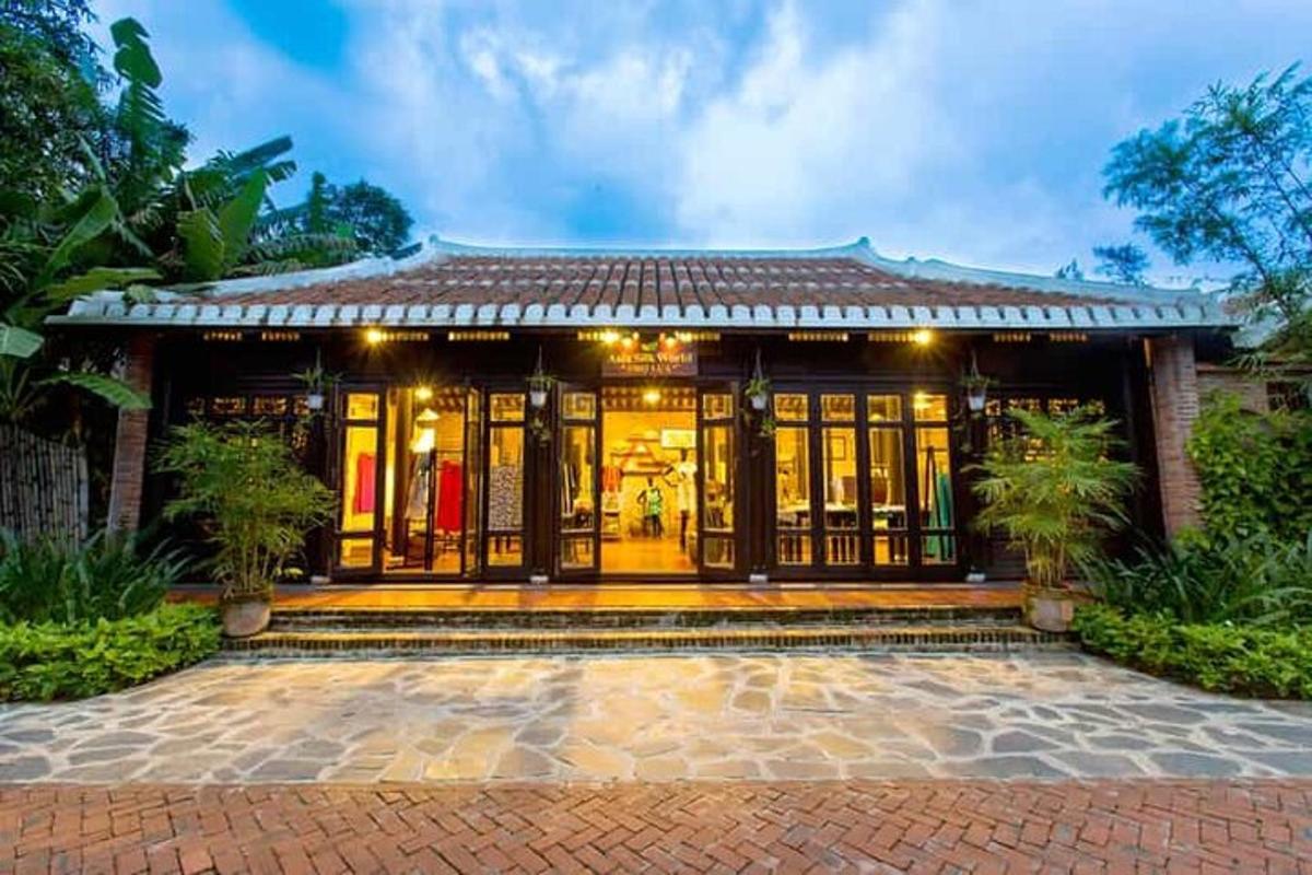 a house with a brick patio in front of it