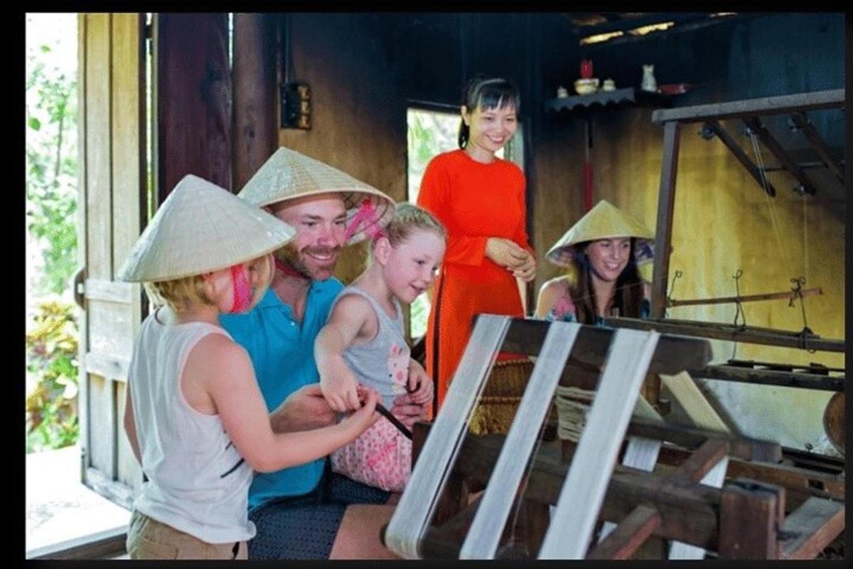 a group of people wearing asian hats in a room