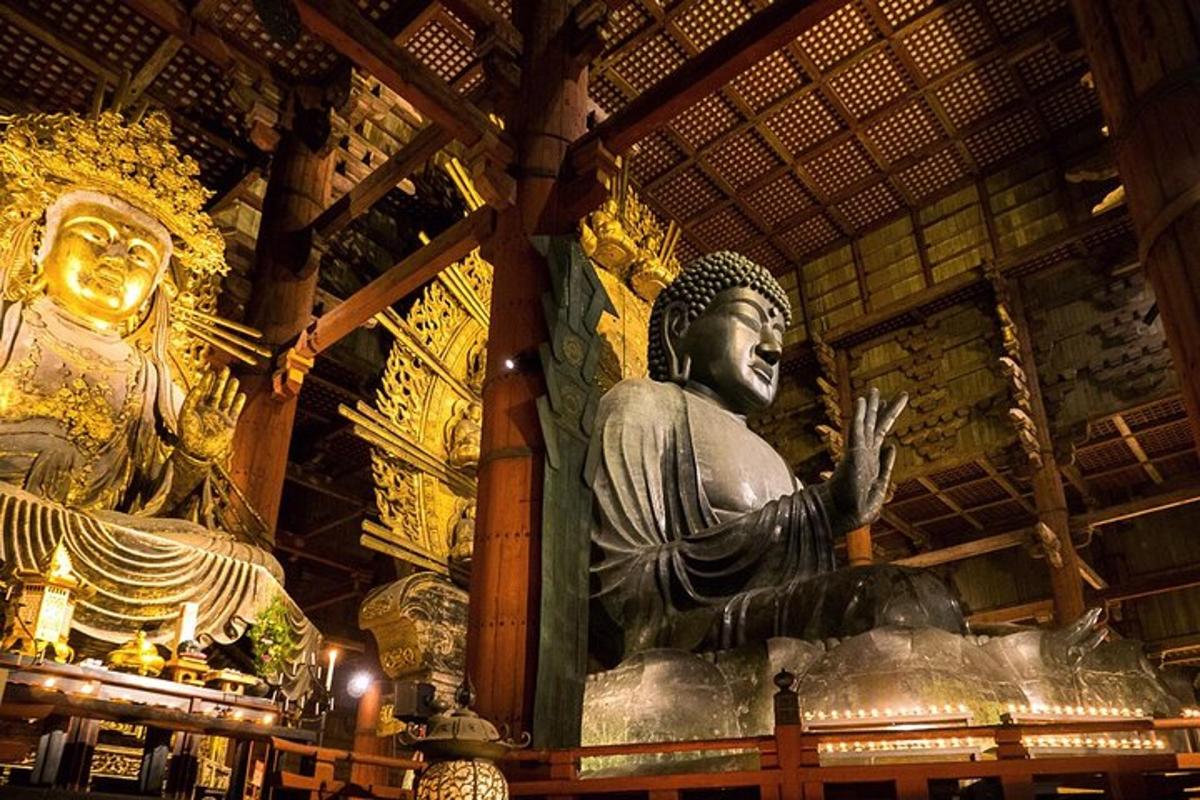 a large statue in a room with a building