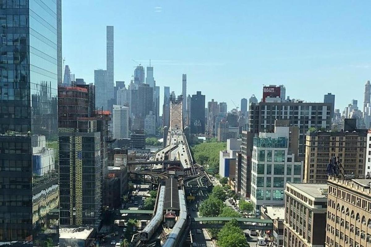 a view of a large city with a highway