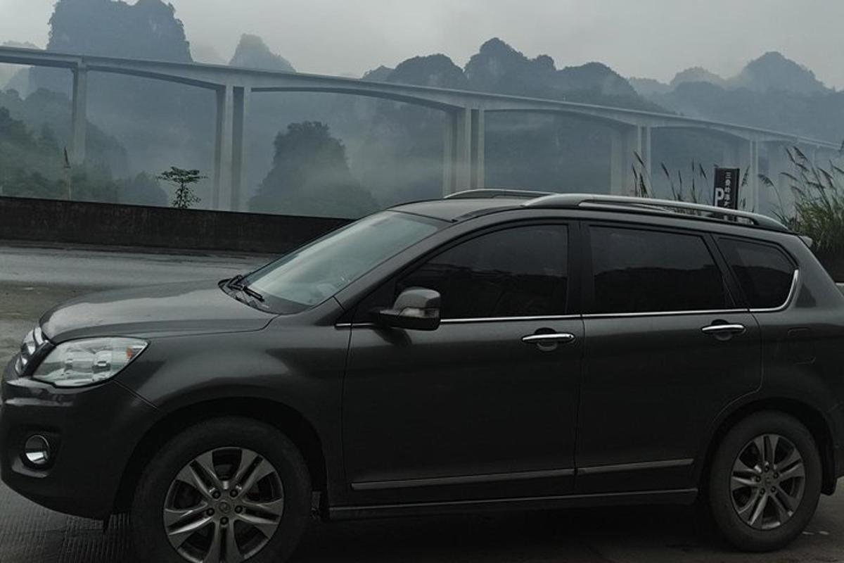 a black suv parked in a parking lot