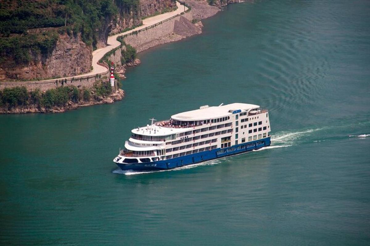 a cruise ship in the water on a river